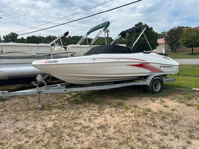 A bow rider is a boat with an open bow area where there are extra seats in front of the windshield.  Bow riders are typically between 17' and 30'long. They are well suited for many recreational water sports such as tubing, water skiing, and swimming.