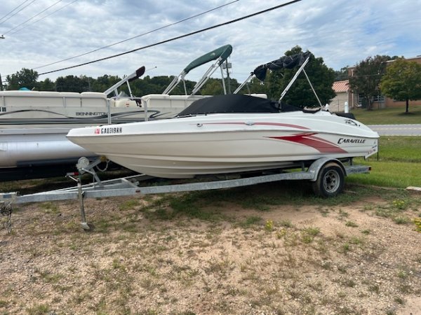 A bow rider is a boat with an open bow area where there are extra seats in front of the windshield.  Bow riders are typically between 17' and 30'long. They are well suited for many recreational water sports such as tubing, water skiing, and swimming.